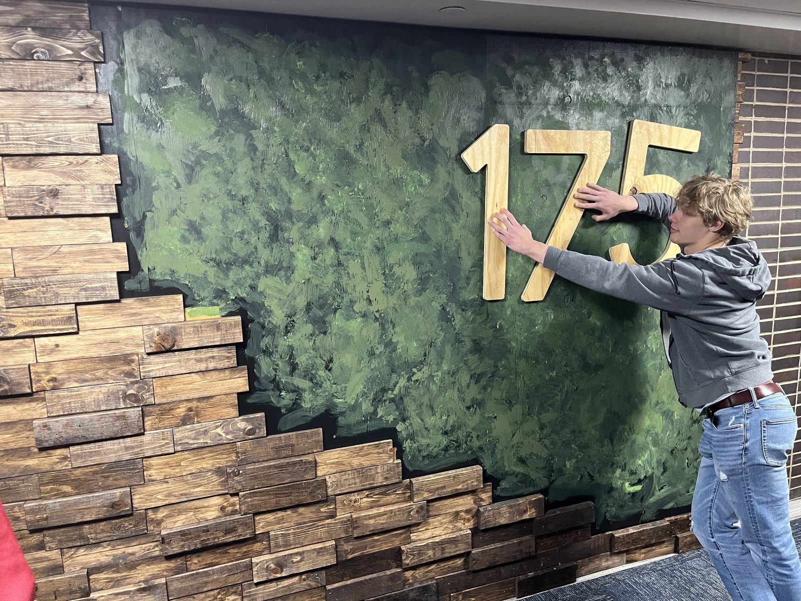 Painting wall green & placing the room number