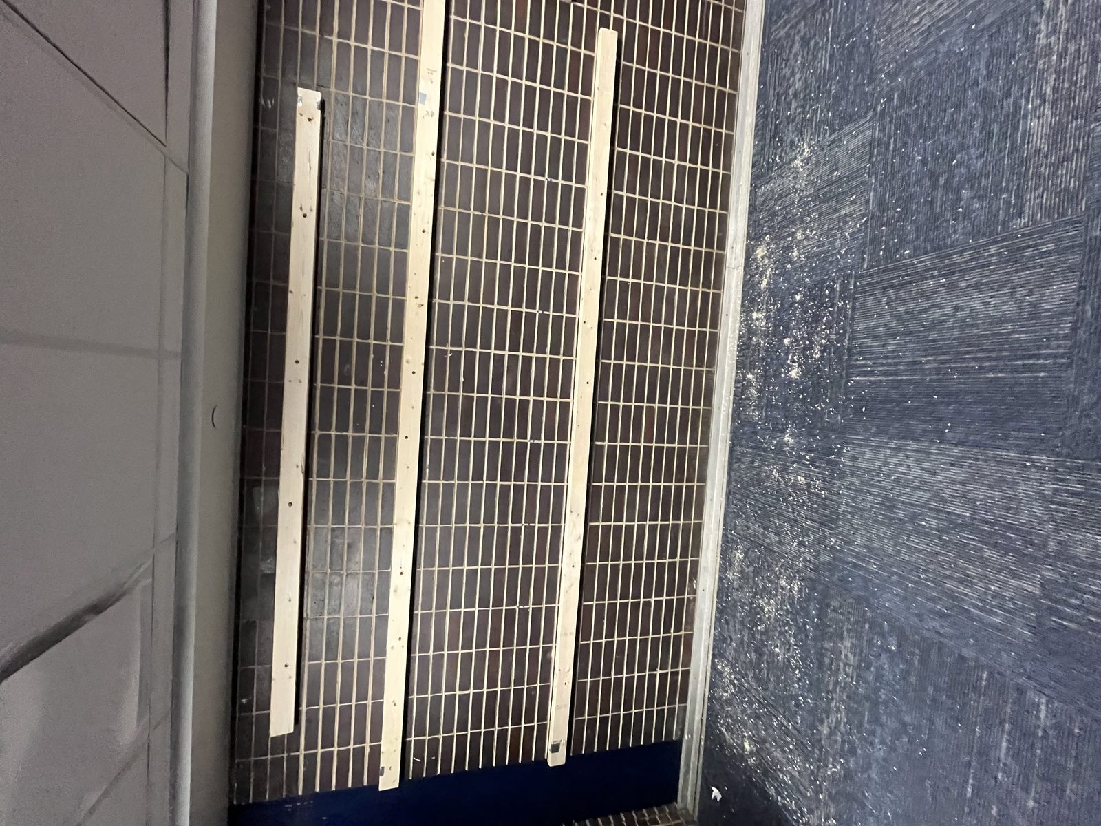 Connecting 2x4's to brick wall